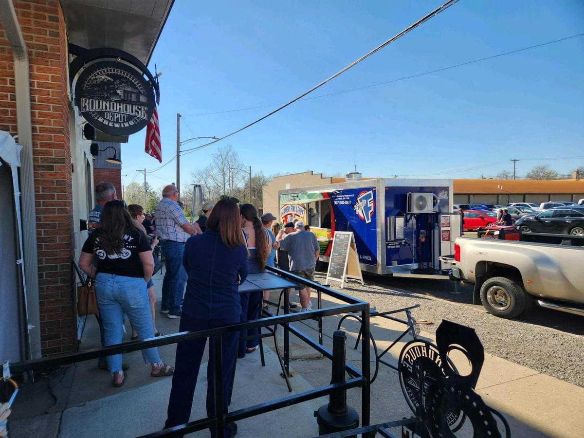 Flappers' Fins & Fries trailer at Roundhouse Depot Brewing Company with a crowd lined up to order